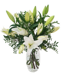 arrangement of lilies with greenery
