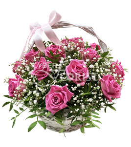 arrangement of pink roses with babys breath