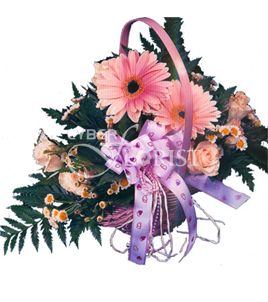 gerberas and roses in a basket