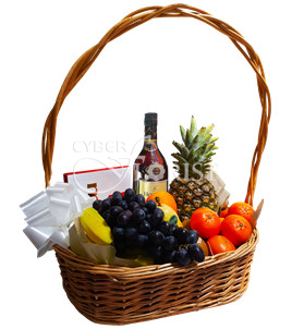 Basket of fruits with cognac and chocolate